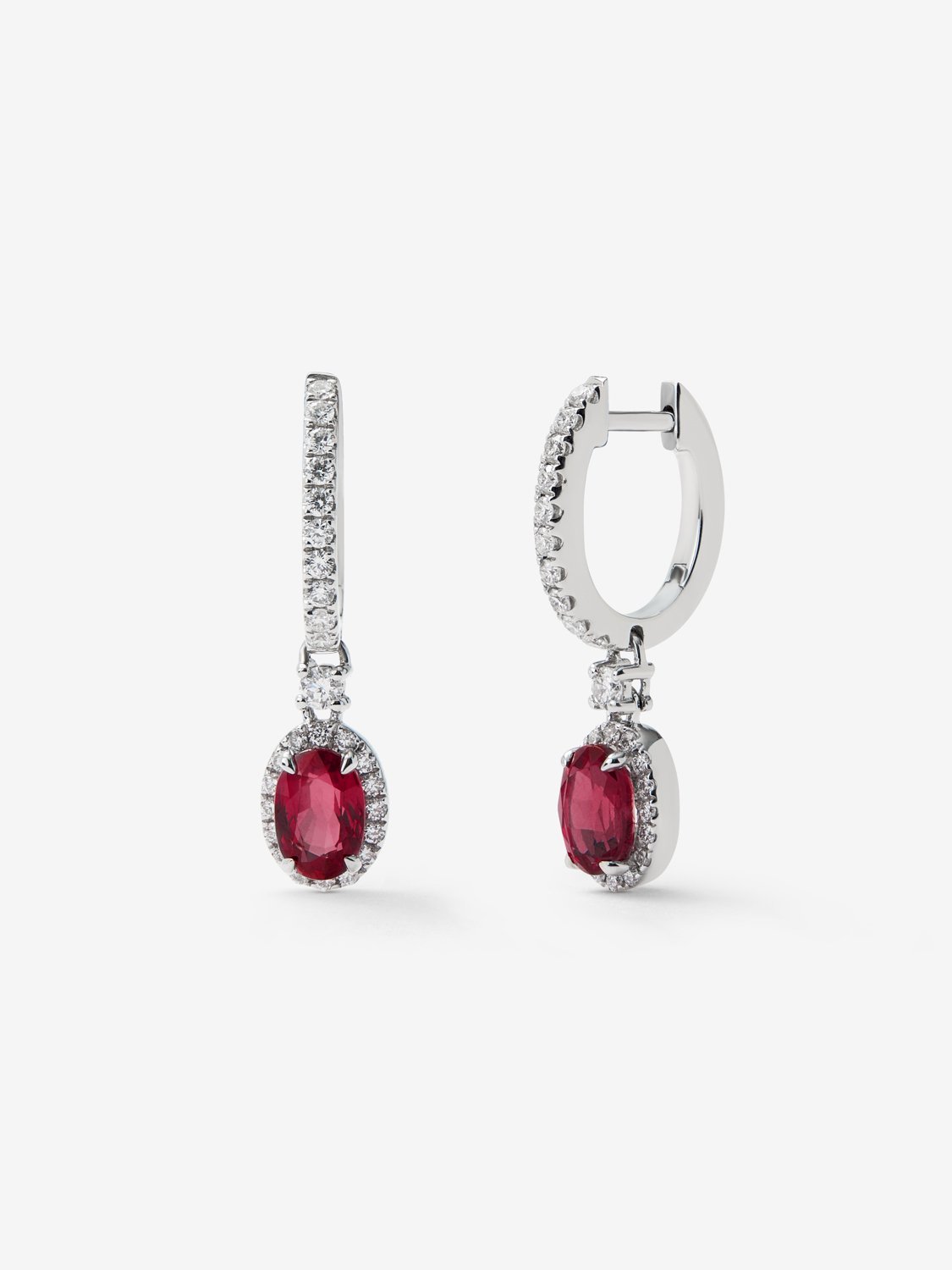 18K white gold earrings with 2 oval-cut red rubies of 2 cts and brilliant-cut diamonds with a total of 0.40 cts