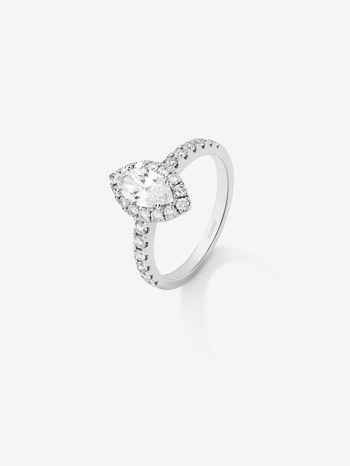 18K white gold ring with marquise cut diamond of 0.56 cts and 34 brilliant cut diamonds with a total of 0.38 cts