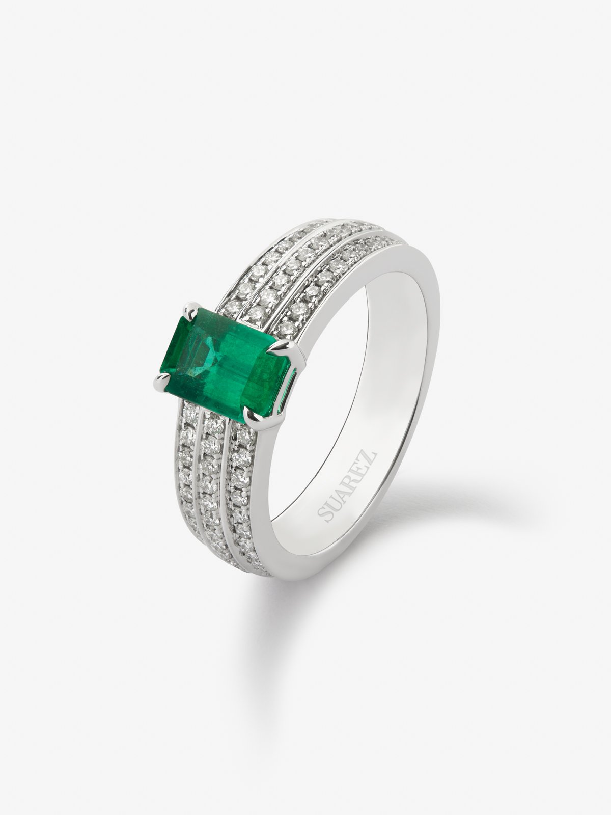 18K white gold ring with octagonal cut emerald of 1,114 cts and 68 brilliant cut diamonds with a total of 0.37 cts