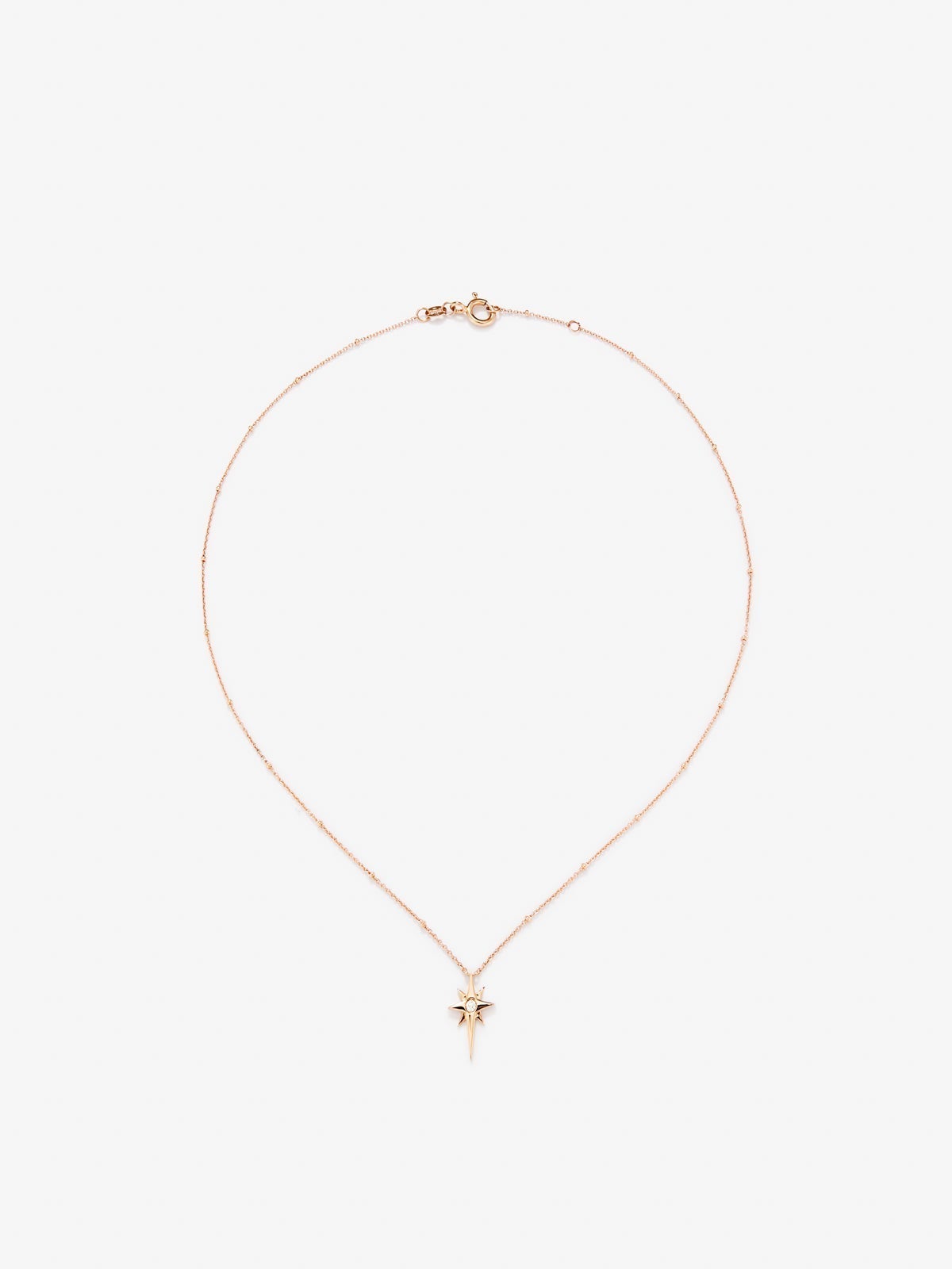 Pendant chain with 18K rose gold star with diamond.